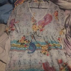 Cute top with drawstring waist.